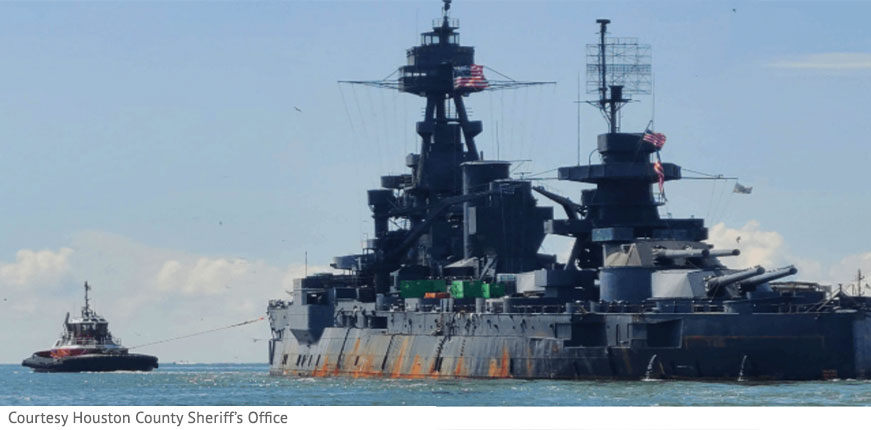 Battleship USS Texas in tow to Gulf Copper dry dock